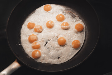 Common quail eggs cooking for breakfast
