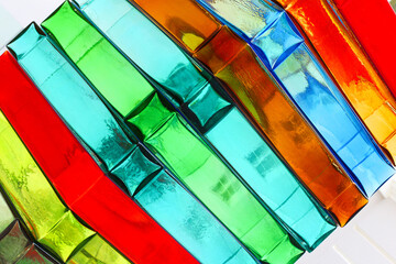 abstract close-up photo of a colored glass sculpture in the shape of rectangles. the concept of an artistic background, wallpaper