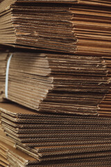 corrugated cardboard for packing, Pile of corrugated cardboard sheets in warehouse