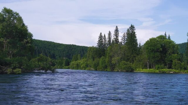Middle Siberia, Krasnoyarsk Territory. Hilly (coniform hill) river bank, pour. Taiga mixed forests