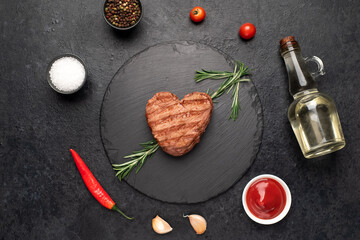 Heart shaped grilled beef steak with arrow for valentine's day on stone background