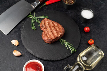 Heart shaped grilled beef steak with arrow for valentine's day on stone background