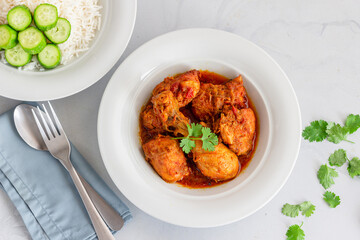 Traditional Indian Chicken Curry with Rice Top Down Close-Up Photo