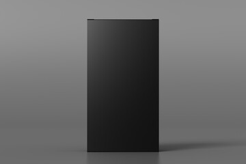 Gift box mock up: tall, flat and wide black box on gray background. Front view.