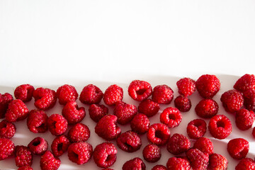 raspberry on white background with copy space