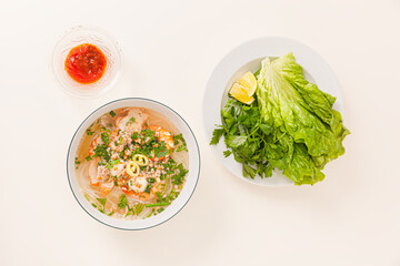 Nam Vang noodles soup, Vietnamese food isolated on white background, top view