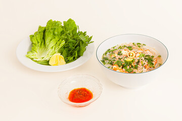 Nam Vang noodles soup, Vietnamese food isolated on white background, perspective view