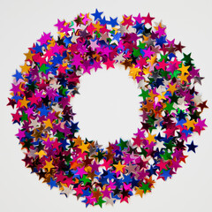 Circle border frame made of glitter on a white background with copyspace