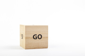 Wooden cubes with the inscription go on a white background