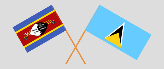 Crossed flags of Eswatini and Saint Lucia. Official colors. Correct proportion