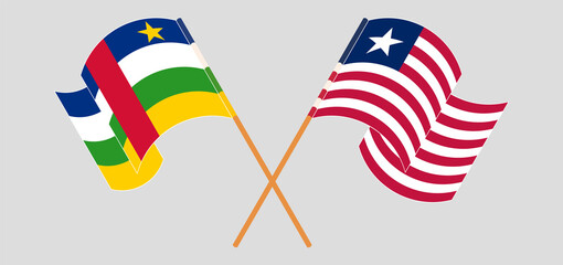 Crossed and waving flags of Central African Republic and Liberia