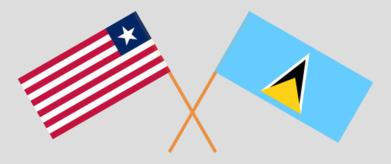 Obraz premium Crossed flags of Liberia and Saint Lucia. Official colors. Correct proportion