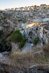 View of the Sassi di Matera a historic district in the city of Matera, well-known for their ancient cave dwellings. Basilicata. Italy