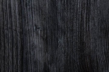 Black wooden texture. Dark textured wood for web and 3d design. Luxury grunge board background. Front view. 