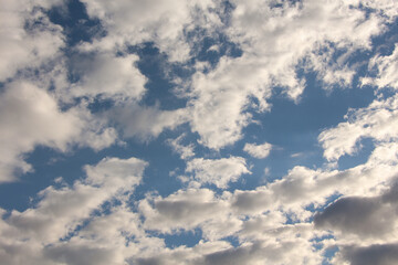 Blue sky with white clouds. Natural air background