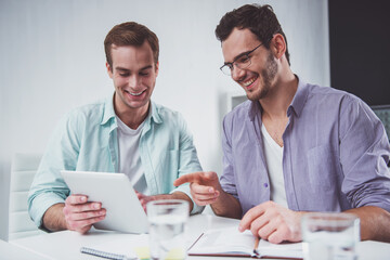 Attractive businessmen co-working