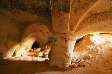 View of rock formation from carved cave in Cappadocia, Turkey