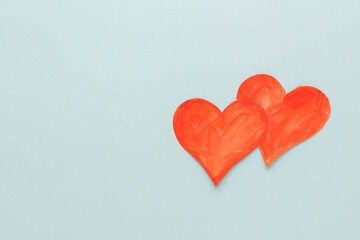 Cut the heart shaped paper, put on a pastel background.