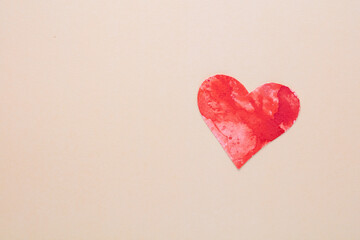Cut the heart shaped paper, put on a pastel background.