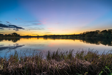 Fototapeta na wymiar Willen lake at sunset in Milton Keynes. England