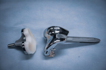  complete explanted knee prosthesis consisting of distal and proximal parts