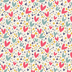 Seamless background with many bright hearts.