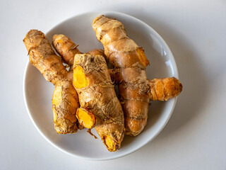 Tumieric on small plate, background