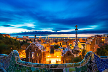 Beautiful sunrise skyline of Barcelona seen from Park Guell which was built  in 1926