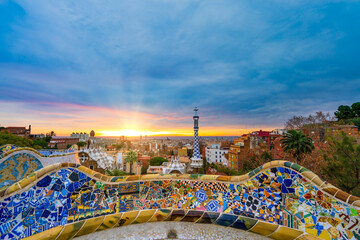 Beautiful sunrise skyline of Barcelona seen from Park Guell which was built  in 1926