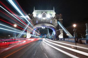 Fototapeta na wymiar Tower Bridge with evening traffic lights in London. England 