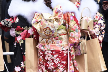 Girls in the coming of age ceremony in kimono. The girls prepare a Kimono known as'Furisode'there coming of ge ceremony. Kimono is a traditional dress in Japan. 