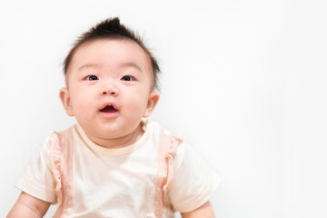 Asian babe girl 5 month smile on white background.