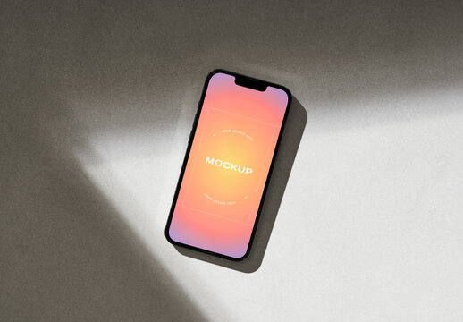 Smartphone on a Gray Background with Shadows