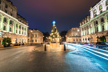 Fototapeta na wymiar Christmas tree on Waterloo Place in London