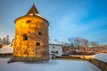 Fototapeta premium The medieval Orava Castle at sunset in winter season, Slovakia, Europe.