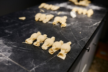 children prepare homemade dumplings and ravioli