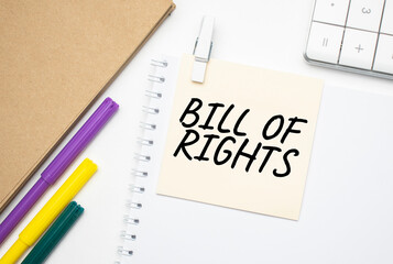 BILL OF RIGHTS Notebook on laptop keyboard, on light background