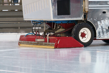 Ice recondition machine car closeup, ice rink ice maintenance polishing and leveling for sport outdoors. 