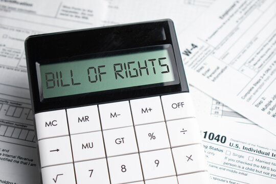 BILL OF RIGHTS Word On Calculator. Business And Tax Concept. Time To Pay Tax In Year.