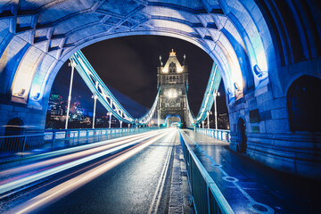 Obraz premium Tower Bridge with evening traffic lights in London. England 