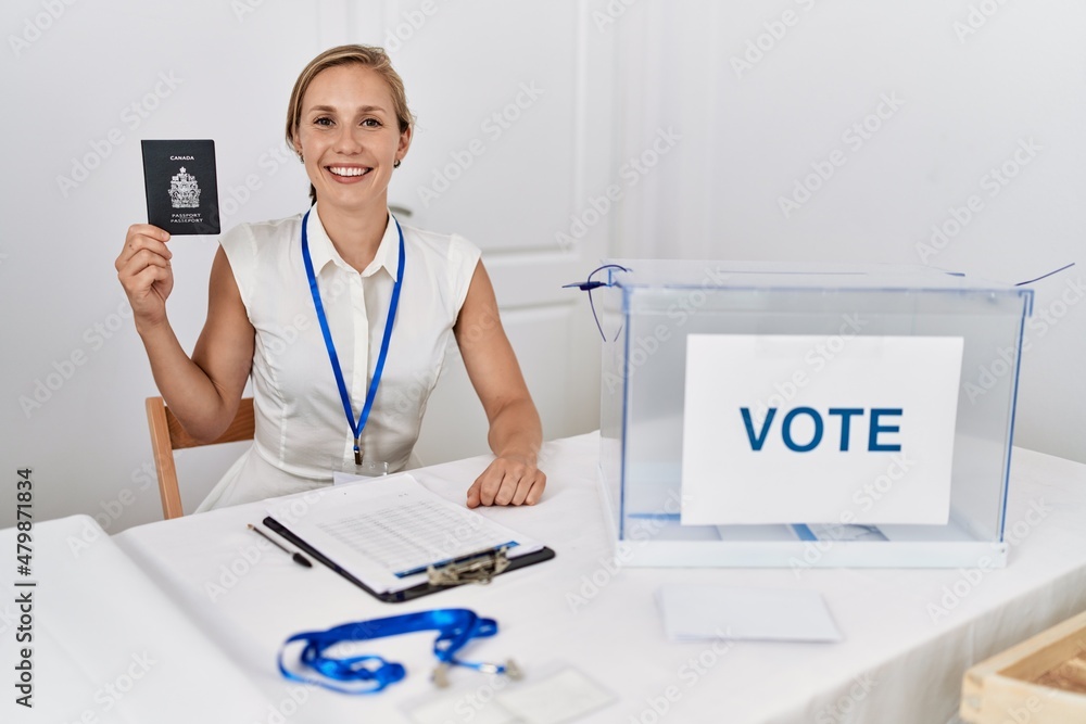 Sticker young blonde woman at political campaign election holding canada passport looking positive and happy