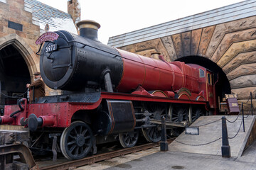 Fototapeta premium Orlando, USA – July 17, 2021: The Hogwarts Express at The Wizarding World Of Harry Potter in Adventure Island of Universal Studios Orlando. Universal Studios Orlando is a theme park in Orlando