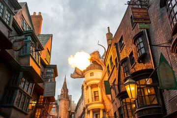 Obraz premium Orlando, USA – July 17, 2021: The Dragon at the Gringotts Bank in Diagon Alley at The Wizarding World Of Harry Potter in Universal Studio Orlando. Universal Studio Orland is a theme park in Orlando.