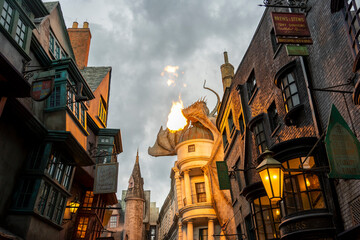 Fototapeta premium Orlando, USA – July 17, 2021: The Dragon at the Gringotts Bank in Diagon Alley at The Wizarding World Of Harry Potter in Universal Studio Orlando. Universal Studio Orland is a theme park in Orlando.