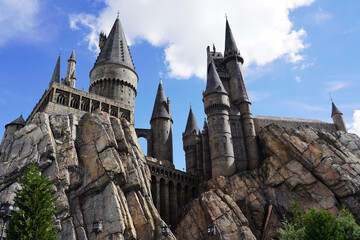 Fototapeta premium Orlando, USA – July 17, 2021: Hogwarts Castle at The Wizarding World Of Harry Potter in Adventure Island of Universal Studios Orlando. Universal Studios Orlando is a theme park in Orlando.