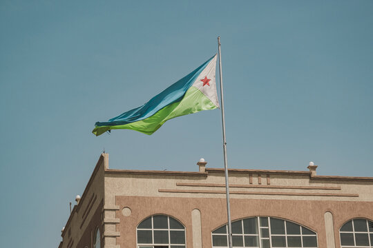 Djibouti flag waving in Djibouti. Editorial shot in Djibouti.