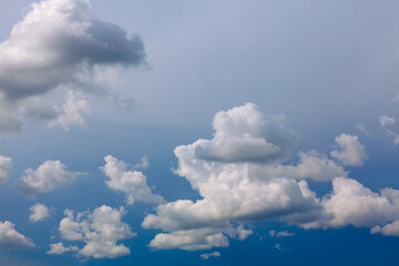 Flight in the clouds . Blue sky with white clouds 
