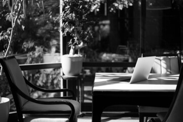 Working laptop in the interior of the apartment
