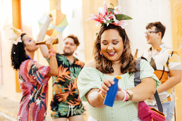 Care during Carnival. Young woman using sunscreen during carnival block