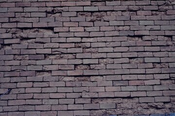 Old demolished brick wall